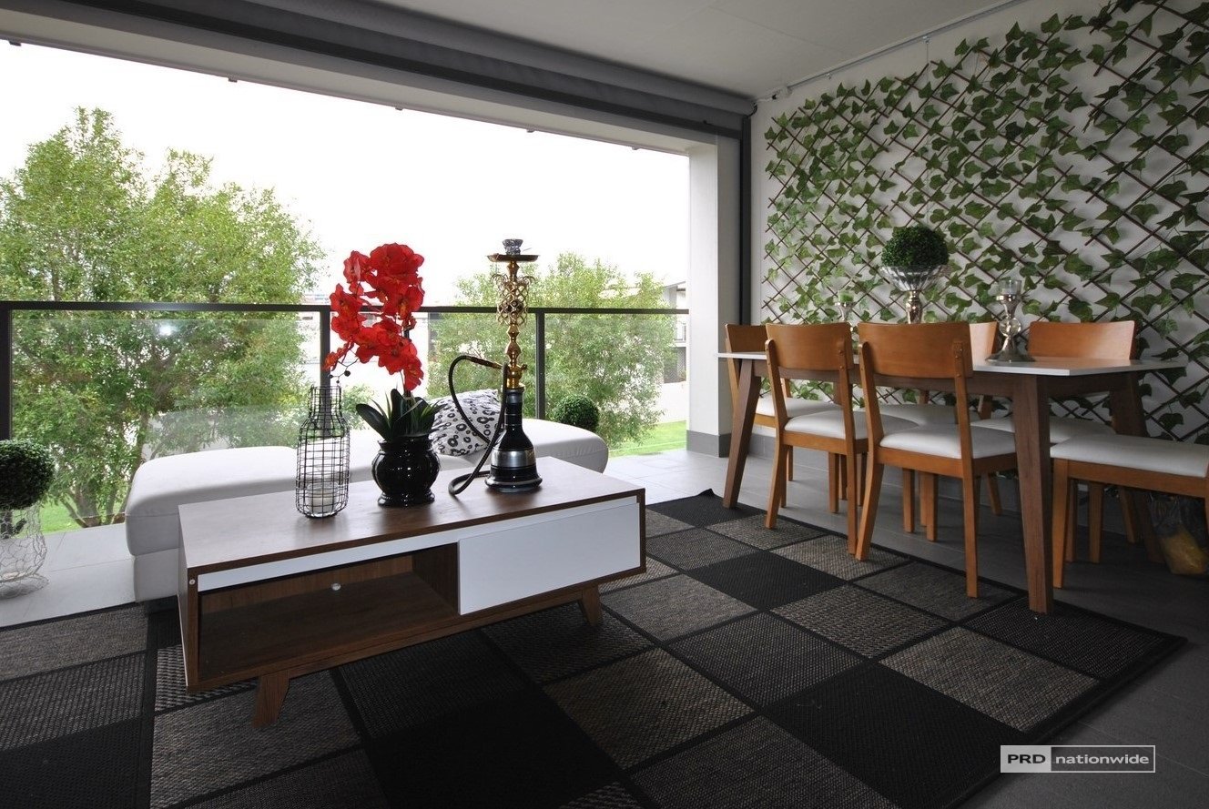 8/61 East Quay Drive BIGGERA WATERS 1