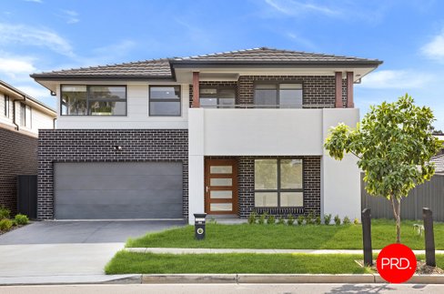84 Willowdale Drive, DENHAM COURT NSW 2565