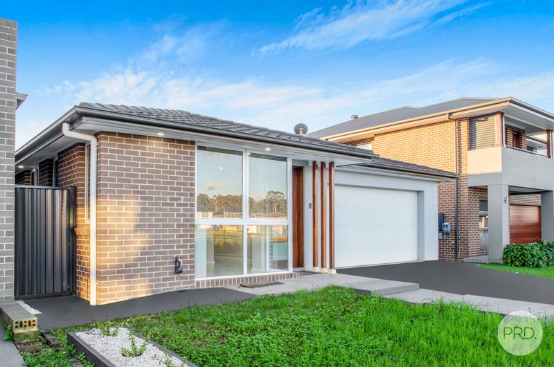 182 Willowdale Drive, DENHAM COURT NSW 2565