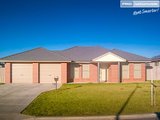 18 Womboin Crescent, GLENFIELD PARK NSW 2650